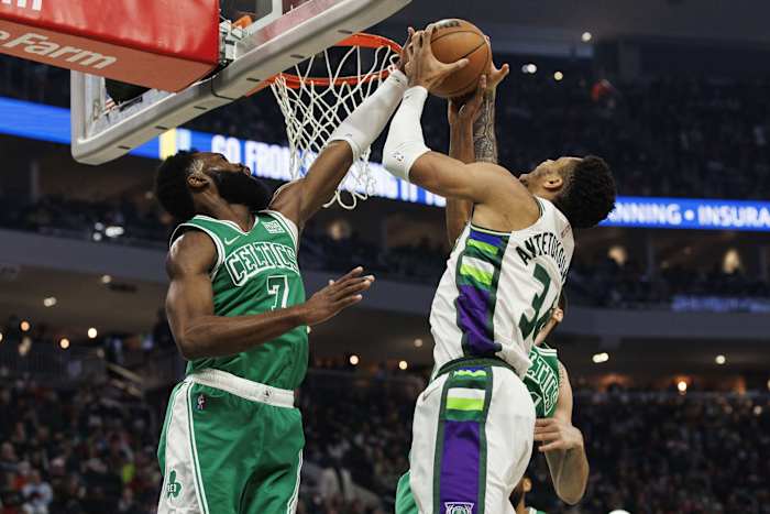 Boston Celtics guard Jaylen Brown (7) blocks the shot of Milwaukee Bucks forward Giannis Antetokounmpo (34)